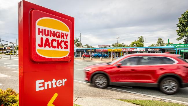 The stores failed to place oil in collection tanks for proper disposal, including a KFC worker caught spilling a container of liquid out the back door of the shop and into a drain. Picture: NewsWire / Sarah Marshall