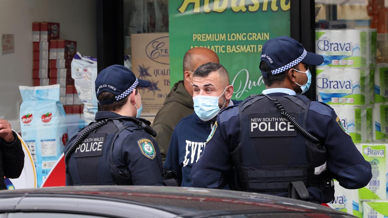 Police officers checking covid compliance in Fairfield City centre on Friday. Picture: Damian Shaw/NCA NewsWire