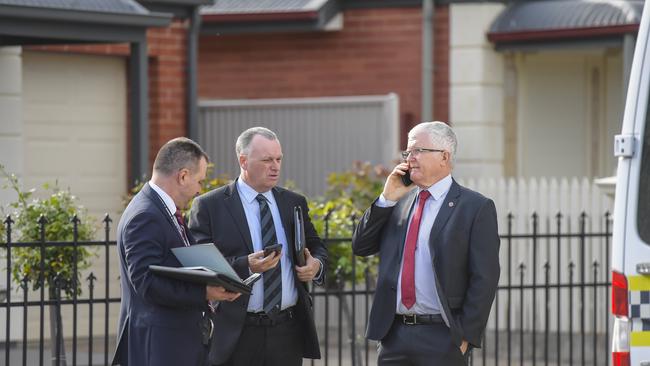 Detectives investigate the fatal house fire in Woodville Gardens. Picture: RoyVPhotography