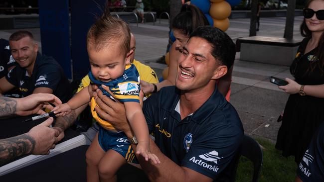 Dylan Brown with a young Parramatta fan at a signing session on the Darwin Waterfront. Picture: Pema Tamang Pakhrin