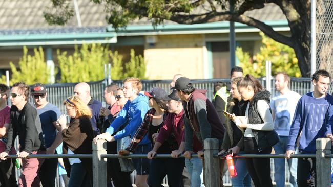 Spectators ring Edinburgh Reserve to watch Brendan Fevola playing for Sandown Cobras against Lyndale.
