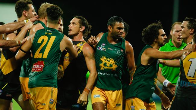 Nightcliff and St Mary's players come to grips in a hotly contested 2020 NTFL Premier League grand final. Picture GLENN CAMPBELL