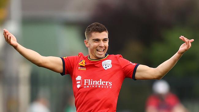 Adelaide United’s Nathan Konstandopoulos celebrates his late winner in the Reds’ seven-goal thriller against Western United. Picture: Robert Cianflone/Getty Images