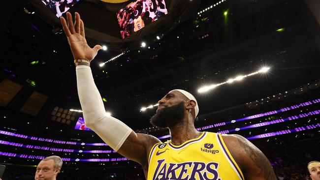 LeBron James salutes the crowd.