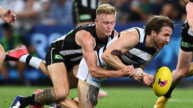 Jaidyn Stephenson tackles Zach Tuohy in the semi-final. Picture: Quinn Rooney/Getty Images