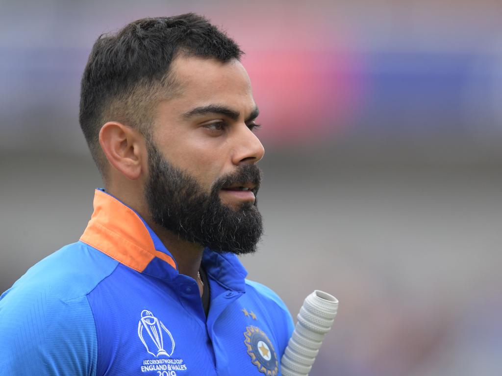 Kohli makes his way back to the sheds.