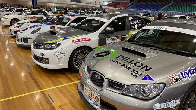 Targa Tasmania competition cars remain in the Silverdome after the event was cancelled. Picture James Bresnehan