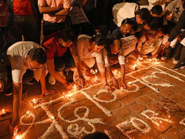 Students take part in a candlelight vigil in Lalitpur in memory of Nepali citizens who were killed in Kibbutz Alumim, one of the flashpoints of the Hamas assault. Picture: Prakash Methema/AFP