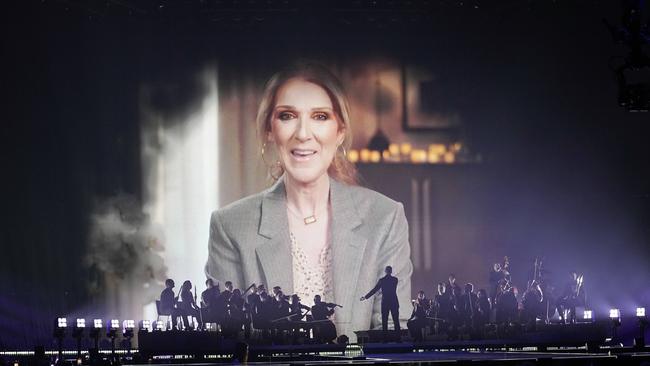 Former Eurovision Song Contest winner Celine Dion, speak in a pre-recorded video message during the first semi-final. Picture: AP.