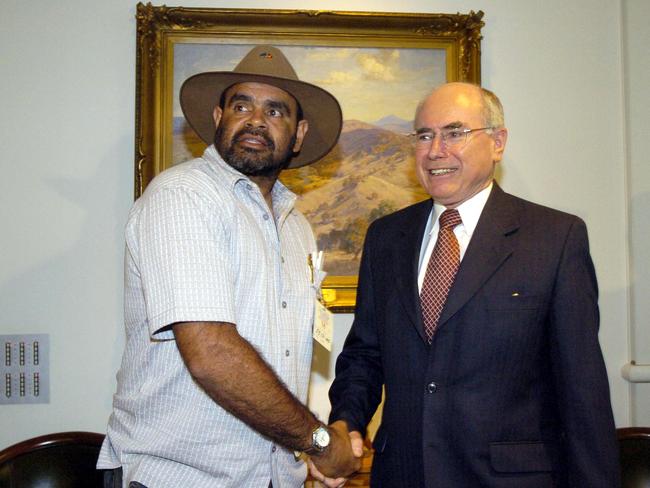 Former Essendon AFL footballer Michael Long meets PM John Howard in his Parliament House office in Canberra at conclusion of his "Long Walk" from Melbourne which was seeking such a meeting to discuss indigenous social &amp; economic problems