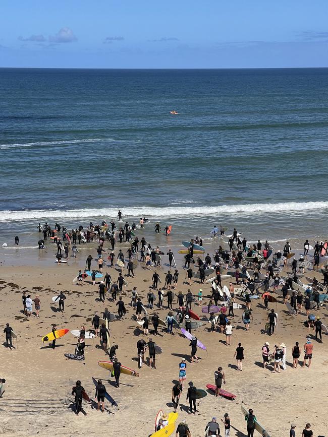 Family and Friends of Khai Cowley gathering at Seaford Beach for a touching paddle out in his honour. Picture: Brett Hartwig