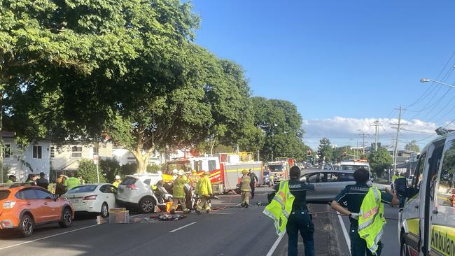 Ambulance officers at the scene. Picture: Jonathan O'Neill