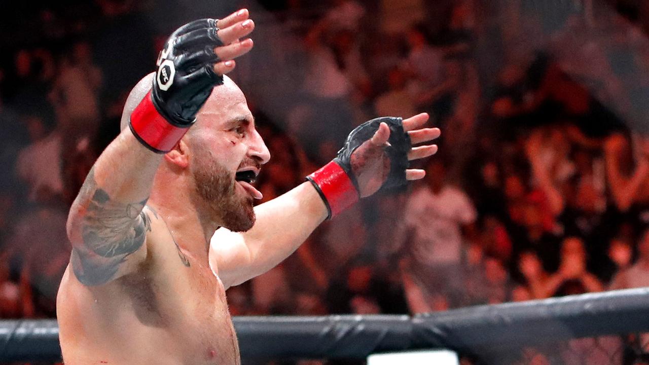 UFC featherweight champion Alexander Volkanovski celebrates after defeating interim featherweight champion Yair Rodriguez during UFC 290 at T-Mobile Arena on July 08, 2023 in Las Vegas, Nevada. Volkanovski retained his title with a third-round TKO. (Photo by Steve Marcus / GETTY IMAGES NORTH AMERICA / Getty Images via AFP)