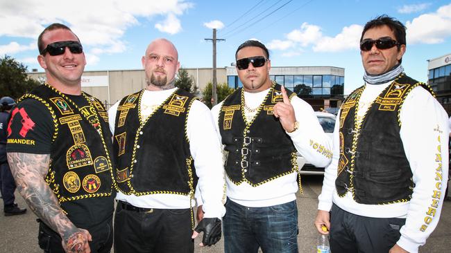 Mark Buddle, Daux Ngukuru and Jay Malkoun, pictured with Mick Murray, have remained members while living overseas.