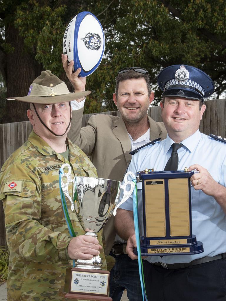 Pumped for the Brett Forte Cup are (from left) Sgt Michael Lawrence, Simon Donaldson and Acting Inspector Greg Wheeler. Brett Forte Cup memorial match will be played between Toowoomba Police and the Royal Australian Corps of Signals Rugby on September 3. Picture: Nev Madsen.