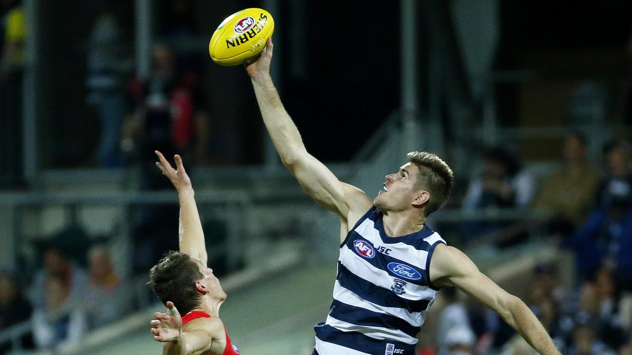 Geelong's Zac Smith wins the tap against the Gold Coast Suns.