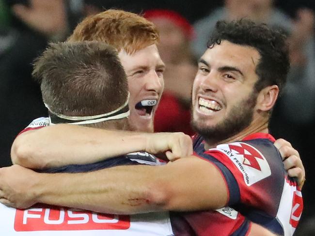 MELBOURNE, AUSTRALIA - APRIL 15:  Nic Stirzaker and Jack Debreczeni of the Rebels celebrate at the full time whistle as they win the round eight Super Rugby match between the Rebels and the Brumbies at AAMI Park on April 15, 2017 in Melbourne, Australia.  (Photo by Scott Barbour/Getty Images)