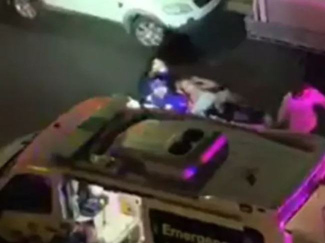 Oliver Solan is loaded into an ambulance. Image courtesy of Channel Nine.