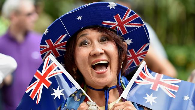 Jamie Wonguthai, who migrated from Thailand 31 years ago, is celebrating Australia Day at the Swanston St parade. Picture: Jay Town.