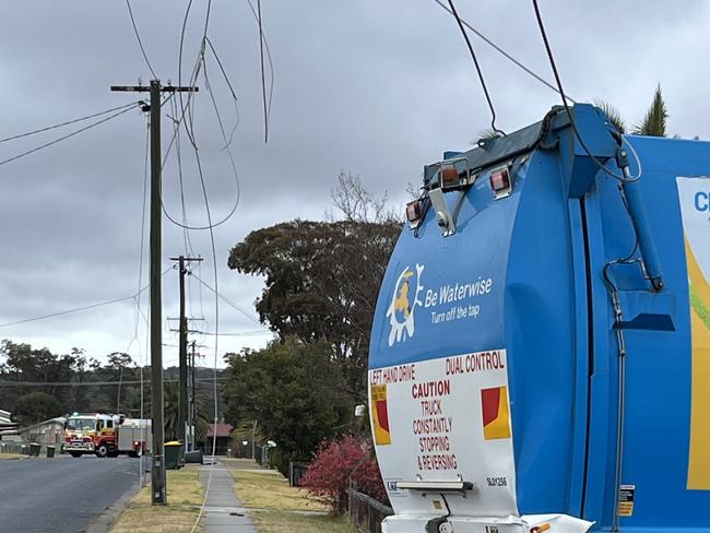 Residents lose power after garbage truck hits pole