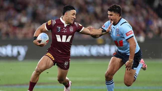 The Maroons briefly threatened to make a comeback, with Valentine Holmes (left) crossing for a try. (Photo by Cameron Spencer/Getty Images)