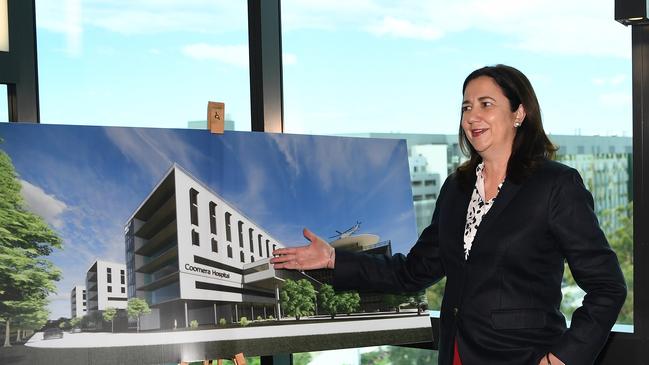 Queensland Premier Annastacia Palaszczuk stands next to an image of the future Coomera Hospital during the 2020 election campaign Picture: NCA NewsWire / Dan Peled