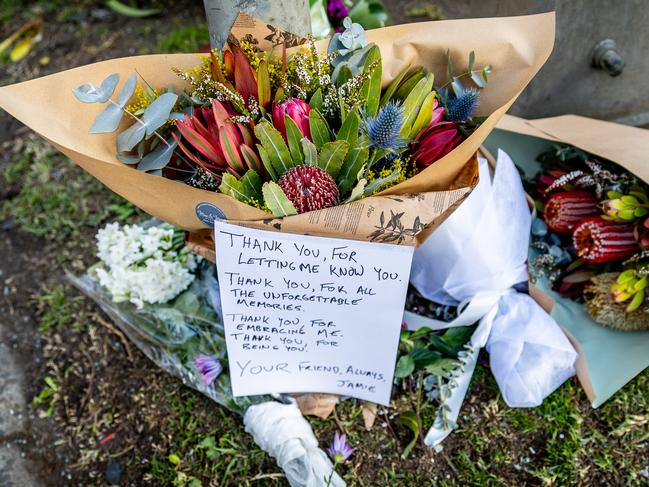 Tributes are left at the scene of a fatal car accident in Burwood. Picture: Jake Nowakowski