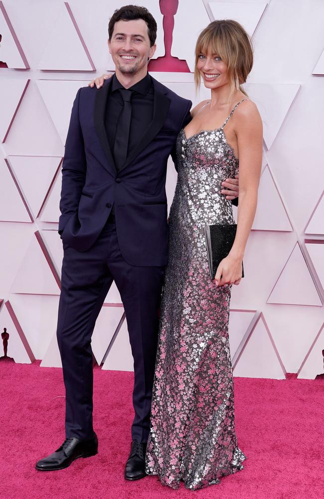 Promising Young Woman producer Margot Robbie , right, with Josey McNamara at the Oscars. Picture: AFP