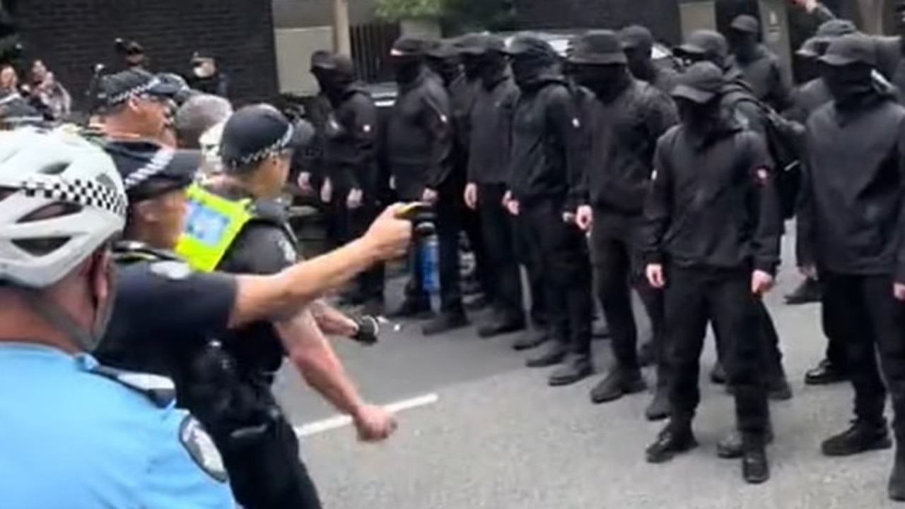 Suspected neo-Nazis crash refugee rally in Melbourne CBD