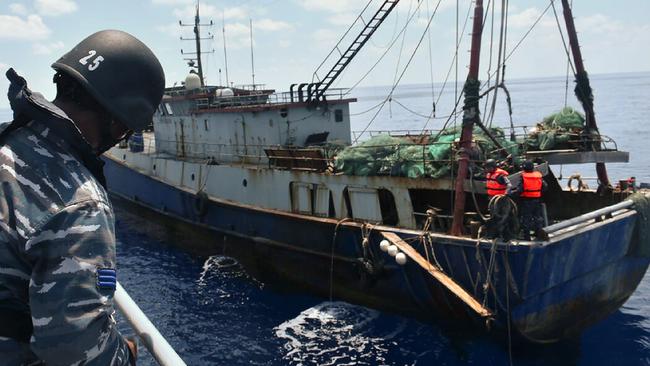 A Chinese fishing vessel is apprehended in Indonesian waters in 2016. Picture: AFP