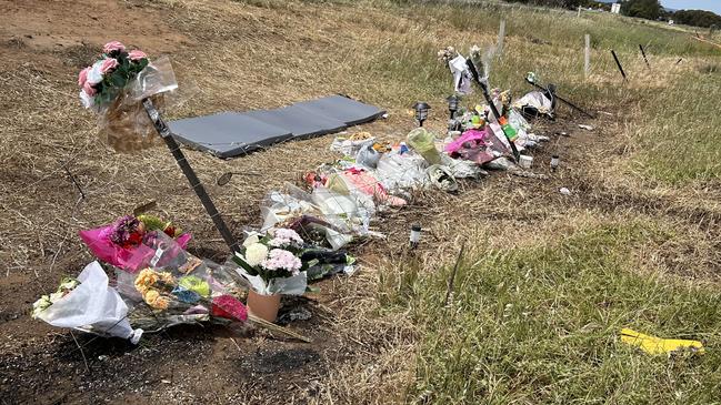 A roadside memorial for a Buckland Park teen killed in a crash in Adelaide's north has grown to several meters as loved ones continue to pay tribute. Picture: Natalie Vikhrov