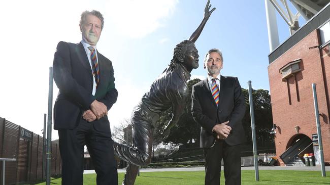 SACA president Andrew Sinclair and SACA chief executive Keith Bradshaw alongside the Jason Gillespie statue at Adelaide Oval on the 19th August 2020. Pic Tait Schmaal.