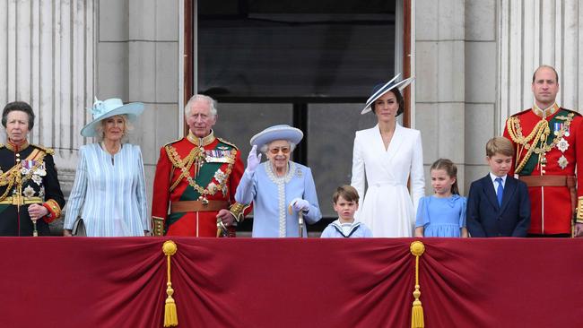 Queen Elizabeth II, centre, with from left, Princess Anne, Camilla the Duchess of Cornwall, Prince Charles, Prince Louis, Kate Middleton, Princess Charlotte, Prince George and Prince William. Picture: AFP