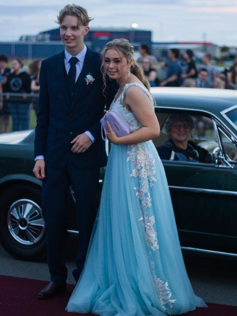 Brodie Henricksen and Keeley Scheuber arrived in a 1966 Ford Mustang.