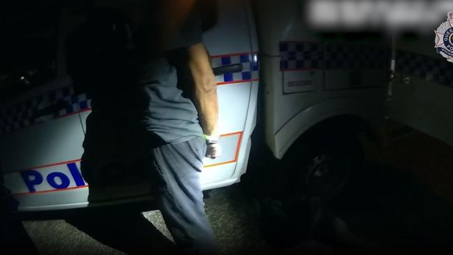 Troy Andrew Burns, 52, is arrested by police at the scene of an incident in Varsity Lakes during which a 15-year-old boy was stabbed. Picture: QPS