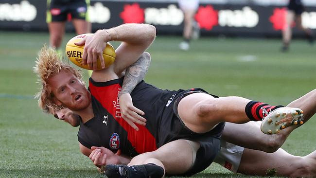 Aaron Francis is tackled by Magpie Jeremy Howe in Round 23. Picture: Michael Klein