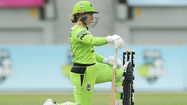 Sydney Thunder’s Tammy Beaumont takes a knee before the WBBL match against the Melbourne Stars at North Sydney Oval. Picture: Getty Images