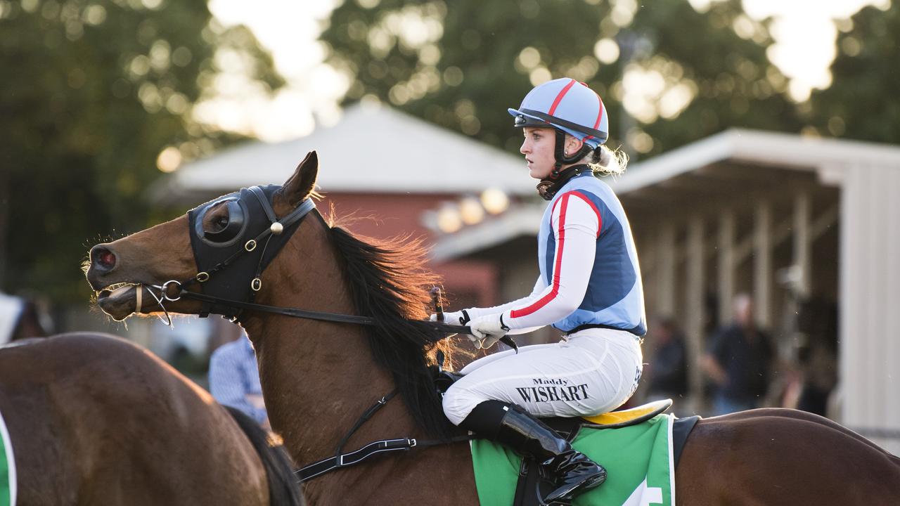 Apprentice Maddy Wishart returns to the Clifford Park winner's stall aboard Wirnpa.