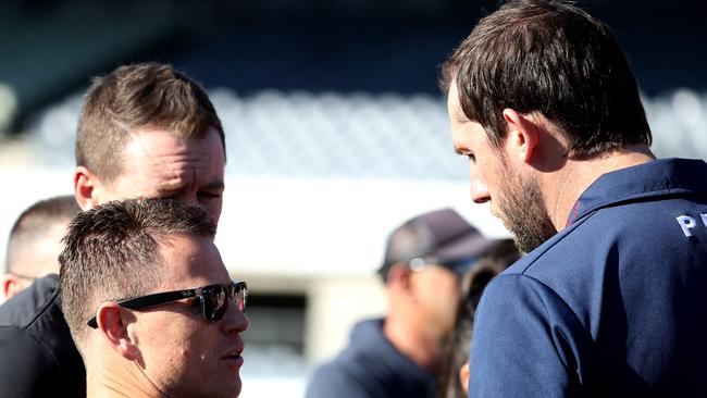 Josh Fraser (right) has a chat with Carlton’s senior coach Brendon Bolton. Picture: Mark Dadswell.