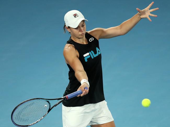 MELBOURNE, AUSTRALIA - JANUARY 13: Ashleigh Barty of Australia plays a forehand during a practice session ahead of the 2022 Australian Open at Melbourne Park on January 13, 2022 in Melbourne, Australia. (Photo by Graham Denholm/Getty Images)