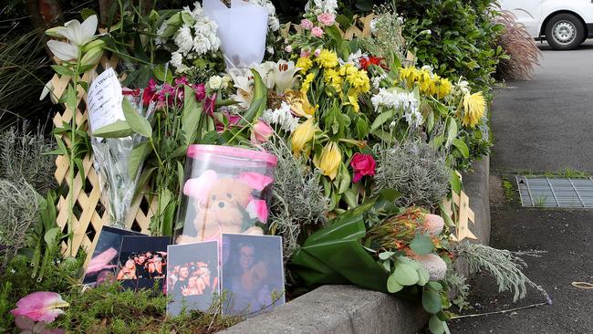 Floral tributes left at the scene. Picture: Toby Zerna