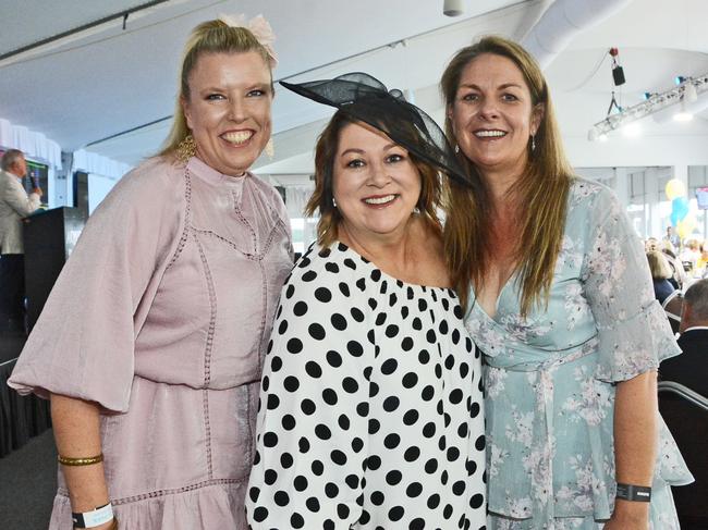 Kirsty Gourlay, Nicola Latcham and Katrina Caldwell at the Rotary Club of Surfers Paradise charity race day at GCTC, Bundall. Pic: Regina King (copyright restrictions apply 07 55322193). "FEES APPLY, ONE TIME USE, NO ON-SELL OR ON-PASS". Pic for The Inside Word GC Bulletin ONE TIME USE ONLY. Please call for permission to use.