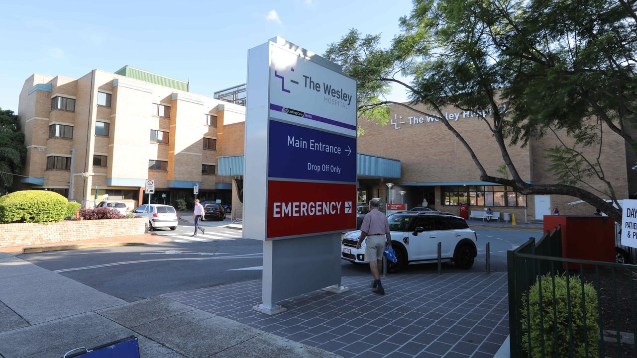 Man fights for life after crash outside hospital