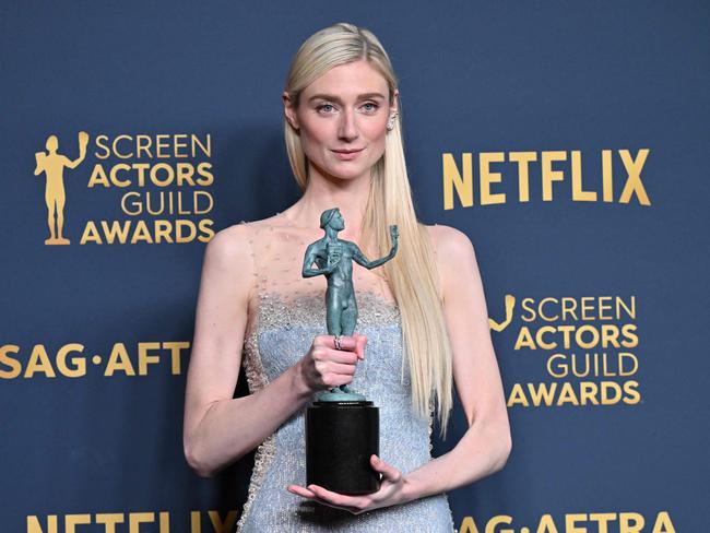 Australian actress Elizabeth Debicki poses in the press room with the award for Outstanding Performance by a Female Actor in a Drama Series for "The Crown" during the 30th Annual Screen Actors Guild awards at the Shrine Auditorium in Los Angeles, February 24, 2024. (Photo by Robyn BECK / AFP)