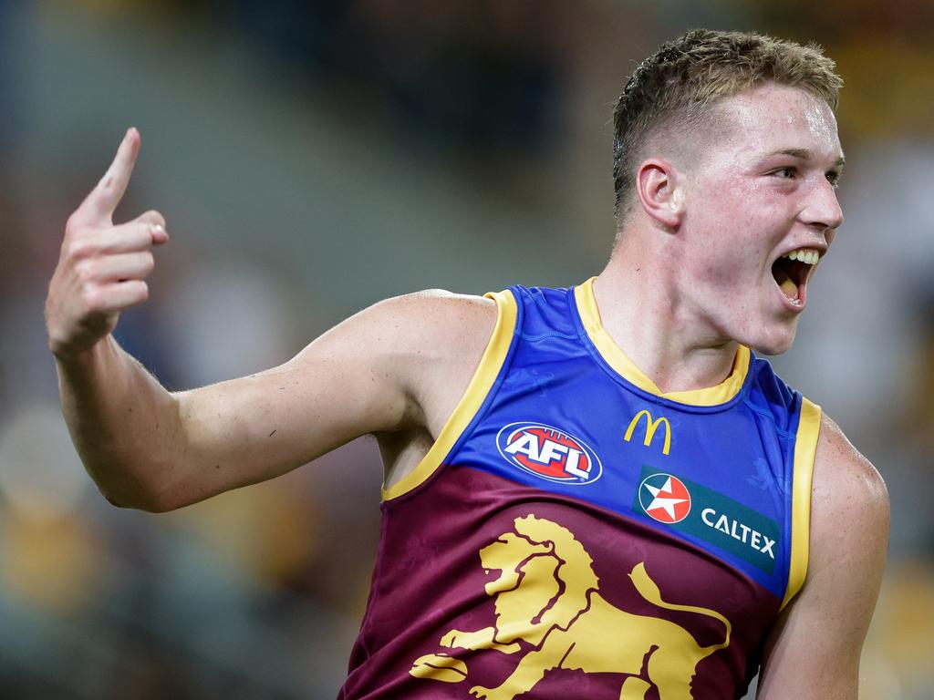 BRISBANE, AUSTRALIA - MAY 05: Logan Morris of the Lions celebrates a goal during the 2024 AFL Round 08 match between the Brisbane Lions and the Gold Coast SUNS at The Gabba on May 05, 2024 in Brisbane, Australia. (Photo by Russell Freeman/AFL Photos)