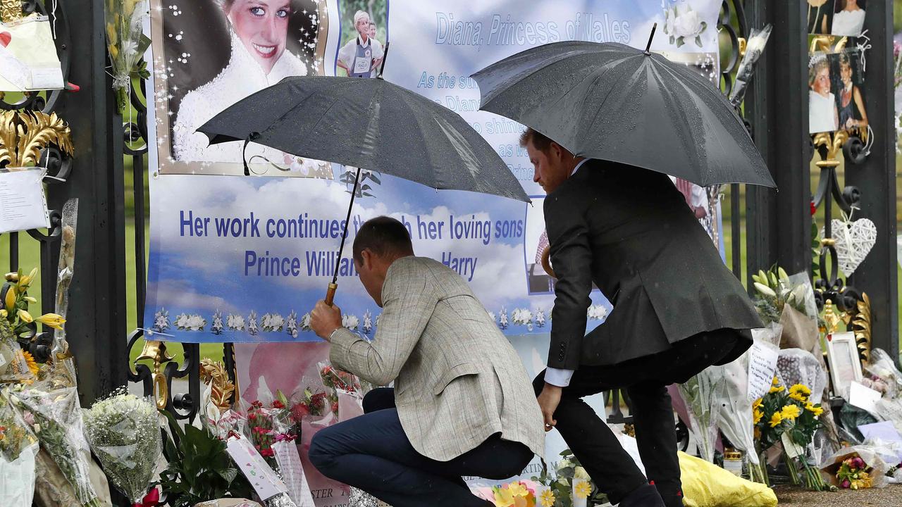 Prince William and Prince Harry viewed tributes left by members of the public. Picture: Kirsty Wigglesworth/AFP