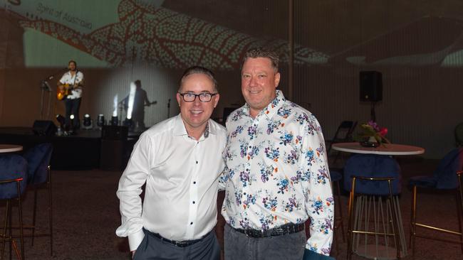 Qantas chief executive Alan Joyce and Tourism NT chairman Michael Bridge at a Qantas cocktail party at the airline’s old hangar in Parap on Thursday.