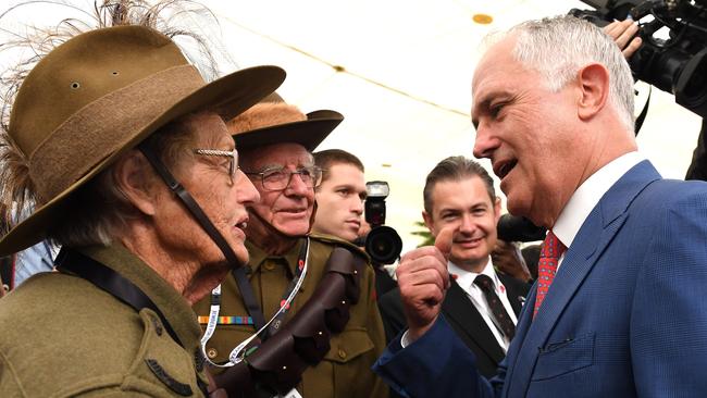 PM Malcolm Turnbull talks to 82-year-old Avon Moffatt, dressed in WWI uniform. Picture: AAP Image