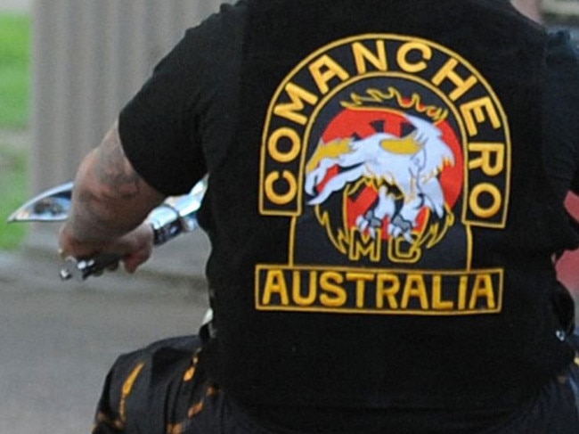 A man who police allege has ties with the Comancheros bikie gang has been arrested on weapon and drugs charges.