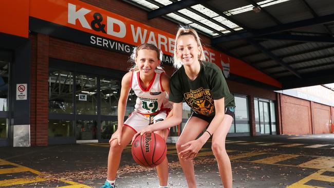 Portia Chopping 12 of Hobart who is part of the Future Development Program with Basketball Tasmania and Ellie Ferguson 14 young basketballer and Jackjumpers fan. University of Tasmania is set to turn the old K&amp;D Warehouse site in Hobart into a basketball centre and student activation site. Picture: NIKKI DAVIS-JONES